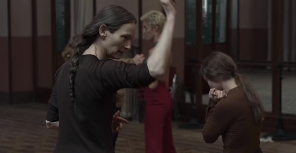 Tilda Swinton as Mme Blanc, strictly instructing her dance class.