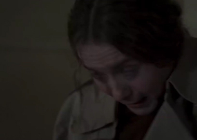 Miss Tanner, broken, wipes away her tears.