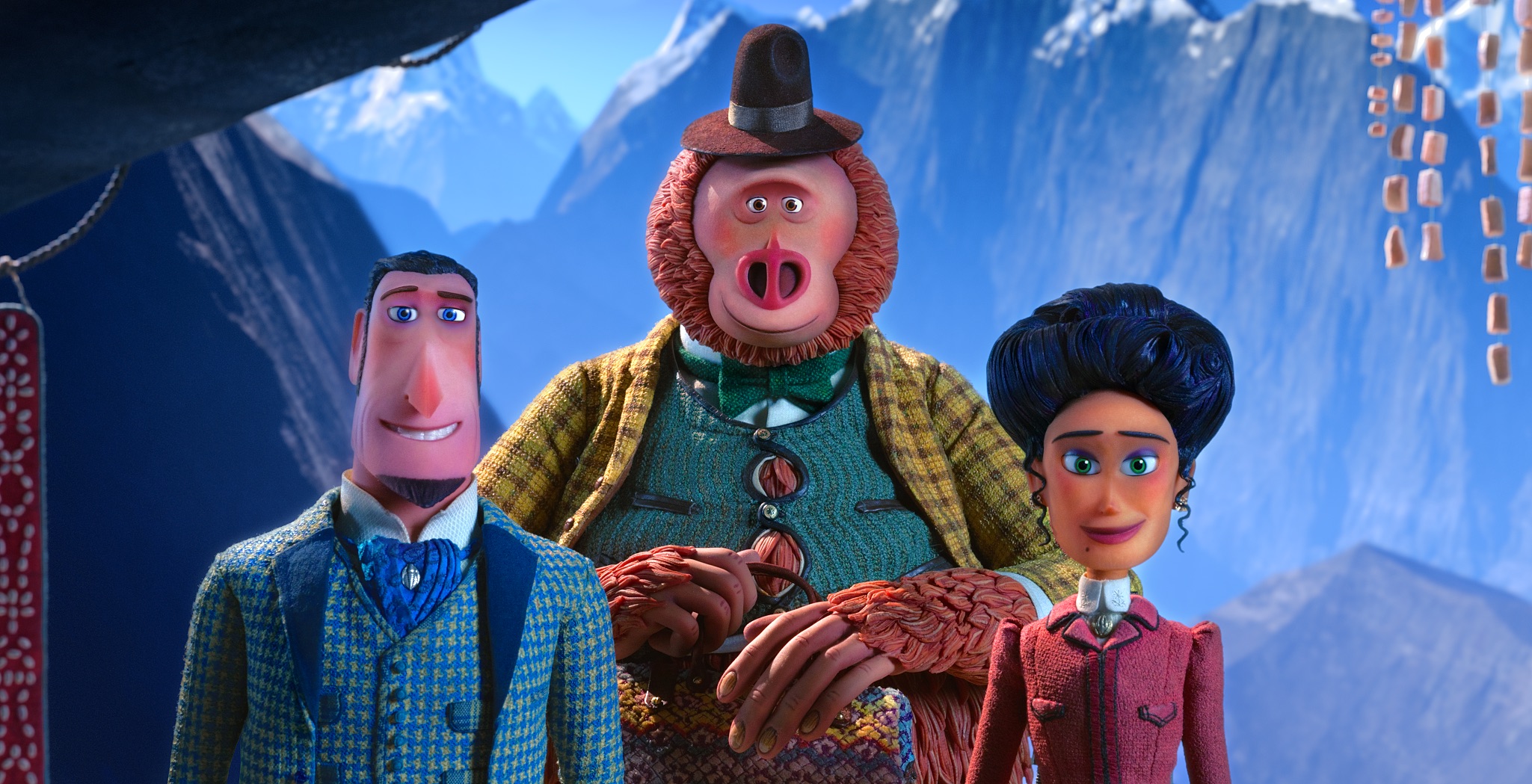 Sir Lionel Frost and Adelina Fortnight pose for a formal portrait with the hairy Mr Link against a snowy, mountainous backdrop.