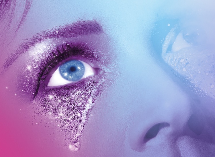 Follies show image. A close up photograph of a showgirls eye covered in glitter.