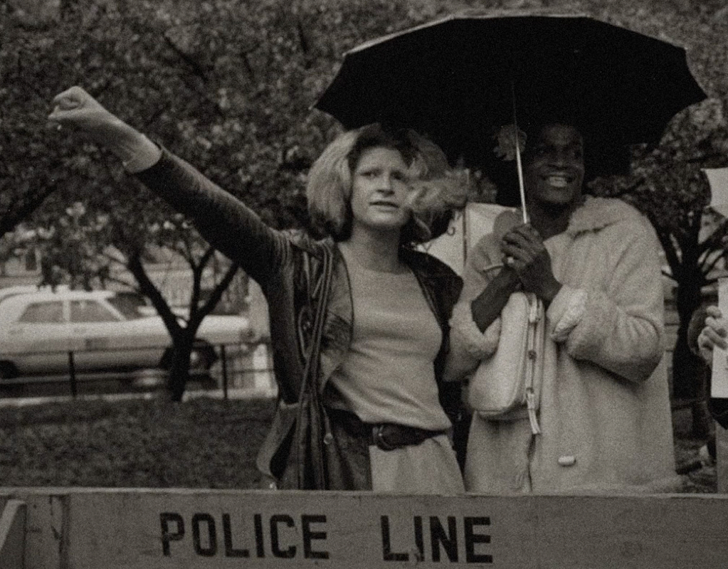 Sylvia Rivera and Marsha P. Johnson stand at the front lines of a protest in New York City, 1973