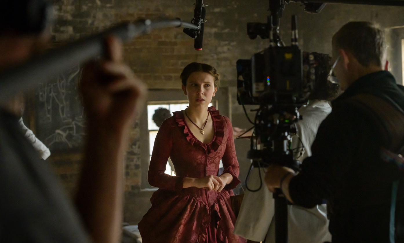 Millie Bobby Brown on the set of *Enola Holmes*